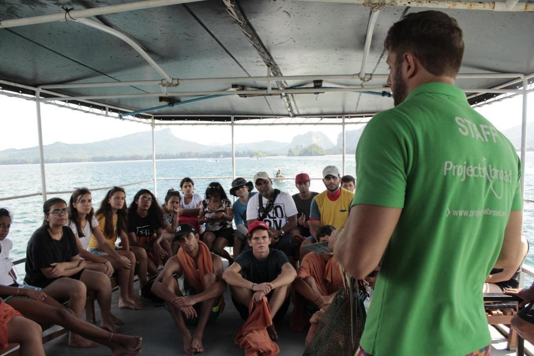 Diving volunteers are briefed by staff before a dive Diving volunteers are briefed by staff before a dive